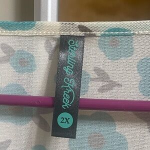 Sterling Kreek Woman’s Cream and Teal Floral Blouse 2x.